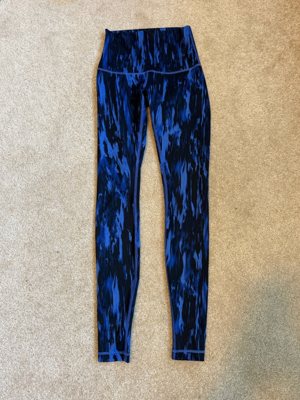 Lululemon blue and black leggings size 4